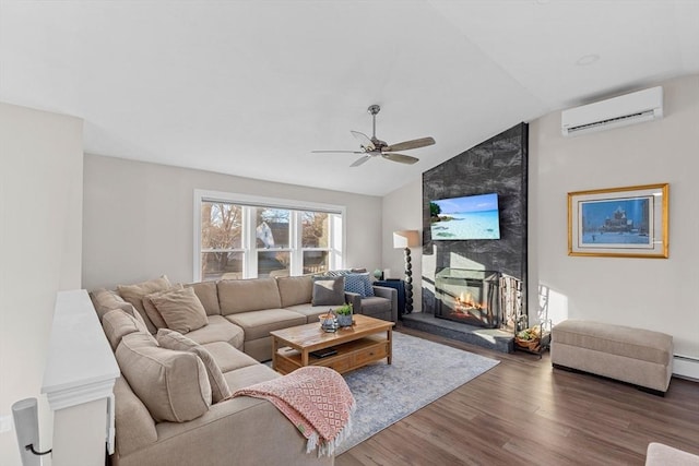 living room featuring a fireplace, dark hardwood / wood-style floors, vaulted ceiling, ceiling fan, and a wall mounted air conditioner