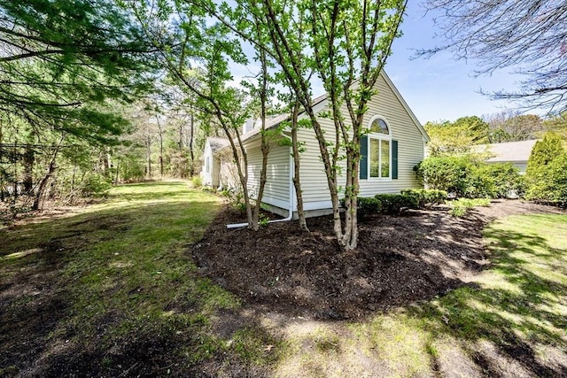 12 Kettle Ln Unit 31, Mashpee, MA 02649 - view of side of property featuring a lawn