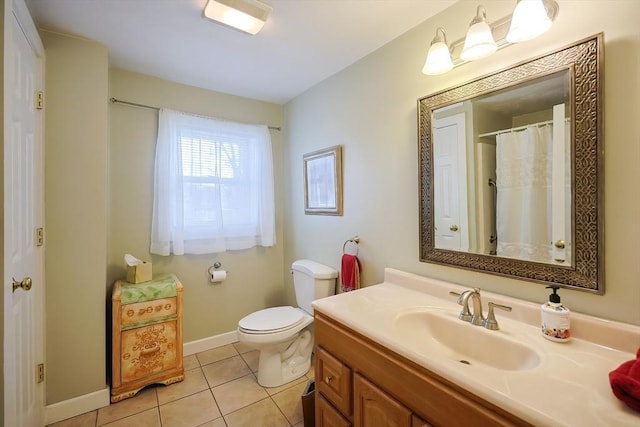 full bathroom featuring vanity, tile patterned floors, toilet, and baseboards