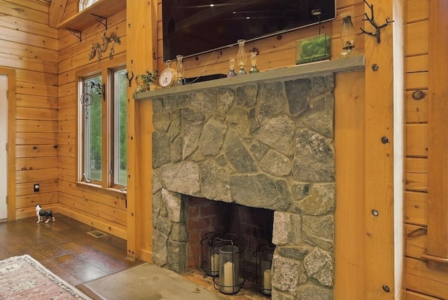 4 Paddock Rd, Rutland, MA 01543 - detailed view of wood finished floors, wood walls, a fireplace, and baseboards
