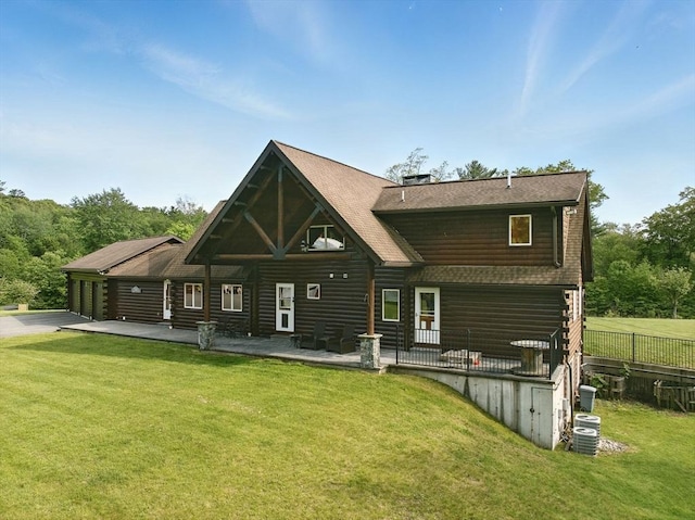 4 Paddock Rd, Rutland, MA 01543 - back of house featuring a patio, a garage, and roof with shingles
