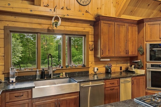 4 Paddock Rd, Rutland, MA 01543 - kitchen with stainless steel appliances, a sink, wooden walls, brown cabinetry, and wooden ceiling
