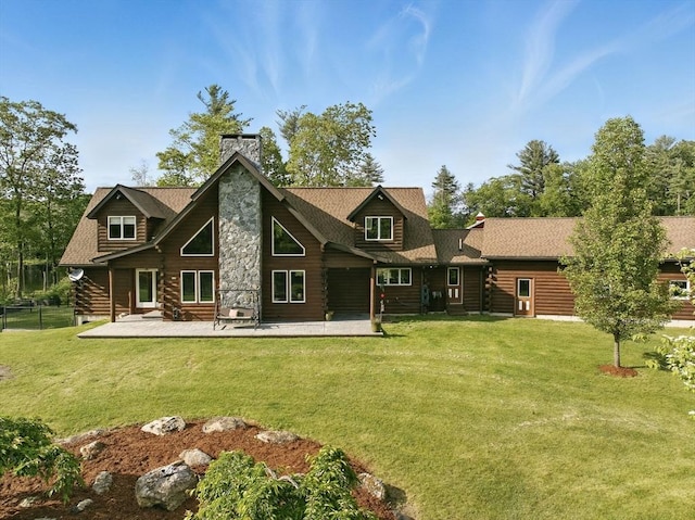 4 Paddock Rd, Rutland, MA 01543 - rear view of property with log exterior, a chimney, a patio area, and a shingled roof