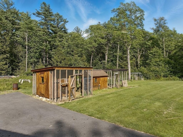 4 Paddock Rd, Rutland, MA 01543 - view of poultry coop with a yard and a view of trees