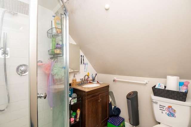 bathroom featuring vanity, an enclosed shower, lofted ceiling, and toilet