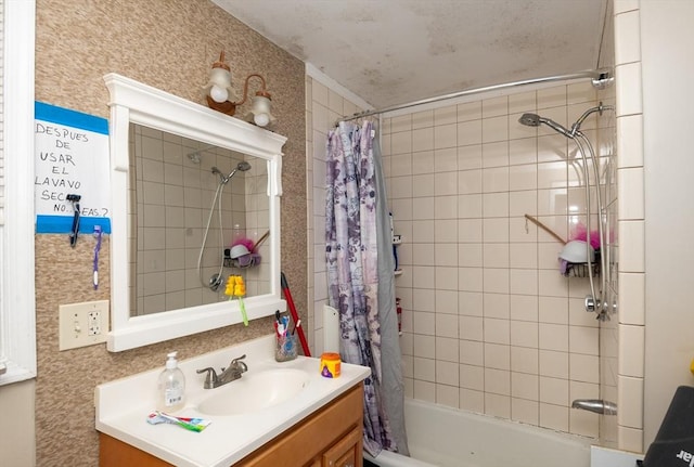 bathroom featuring shower / bath combo, vanity, and crown molding