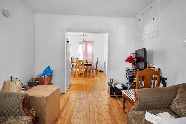 living room with light hardwood / wood-style flooring