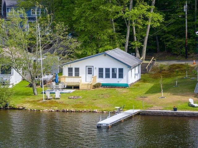 35 Island Rd, Holland, MA 01521 - back of house featuring a lawn and a deck with water view