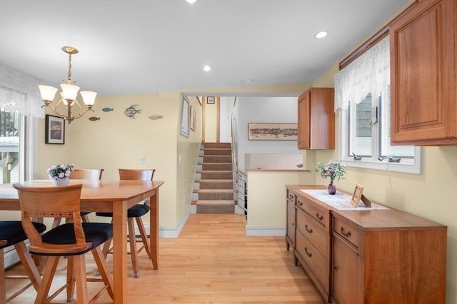 5 I St Unit 2, Newburyport, MA 01950 - kitchen featuring light wood-style floors, plenty of natural light, a chandelier, recessed lighting, and brown cabinets
