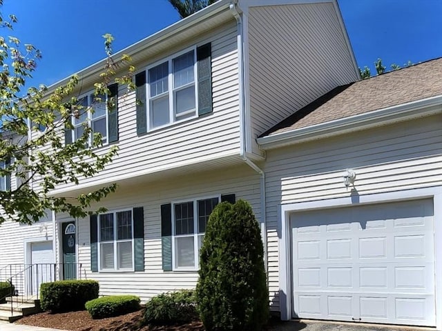 10 Jaclyn Ln Unit 10, Pembroke, MA 02359 - view of side of home with a garage