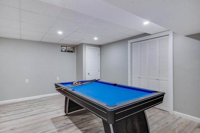 playroom with billiards, a drop ceiling, and light wood-type flooring