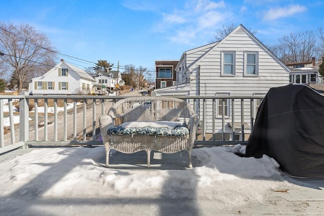 view of patio / terrace featuring a grill and a residential view