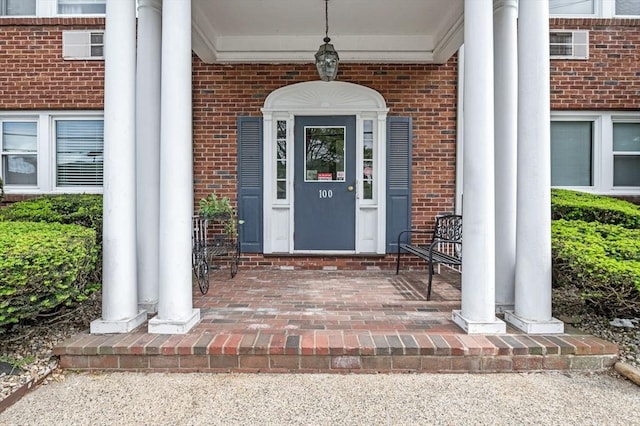 100 Magnolia Ave Unit 26, Lynn, MA 01904 - property entrance featuring a porch and brick siding