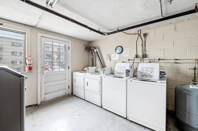 100 Magnolia Ave Unit 26, Lynn, MA 01904 - community laundry room with washer and clothes dryer and concrete block wall