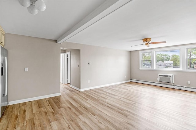 100 Magnolia Ave Unit 26, Lynn, MA 01904 - empty room featuring light wood finished floors, baseboards, ceiling fan, beamed ceiling, and a wall mounted air conditioner