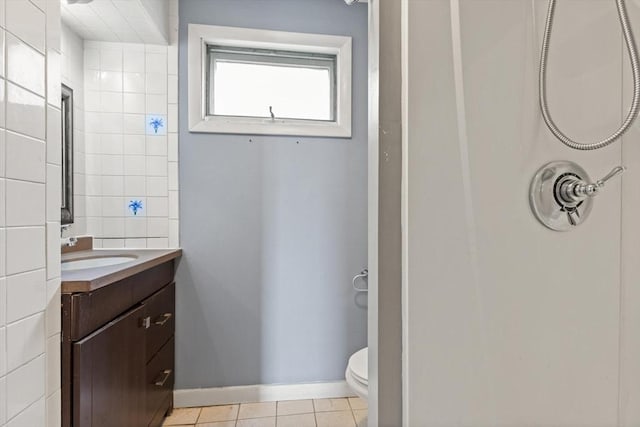 57 Bessom St, Lynn, MA 01902 - bathroom featuring vanity, a shower, and tile patterned flooring