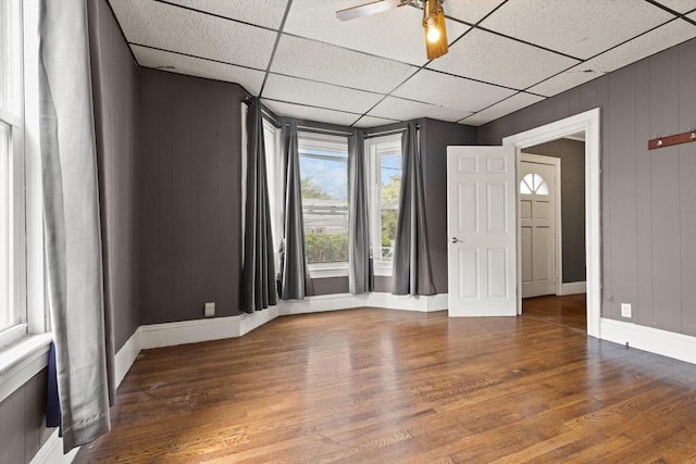 57 Bessom St, Lynn, MA 01902 - unfurnished room featuring a drop ceiling, wood finished floors, and a ceiling fan
