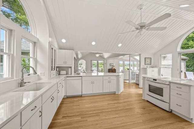 5 Kidd Way, Orleans, MA 02653 - kitchen featuring white appliances, a sink, lofted ceiling, a peninsula, and a ceiling fan