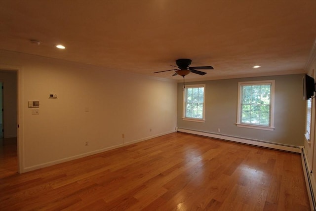 unfurnished room with crown molding, a ceiling fan, recessed lighting, and baseboard heating
