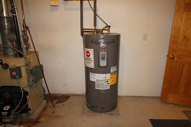 utility room featuring a heating unit and water heater