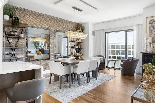 300 Blvd 3I, Boston, MA 02210 - dining area with a chandelier and wood finished floors