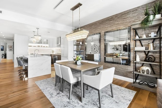 300 Blvd 3I, Boston, MA 02210 - dining area with a chandelier, wood finished floors, and recessed lighting