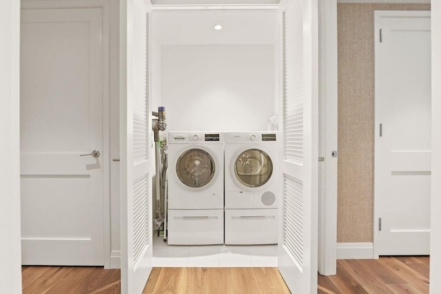 300 Blvd 3I, Boston, MA 02210 - laundry area with washing machine and dryer, wood finished floors, and baseboards