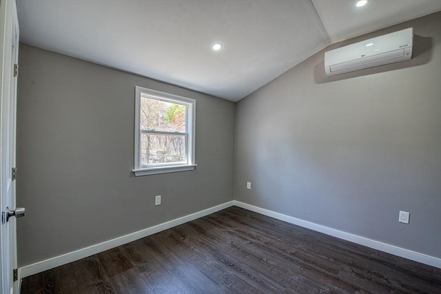 22 3rd, Lakeville, MA 02347 - unfurnished room featuring dark wood-style flooring, baseboards, an AC wall unit, lofted ceiling, and recessed lighting