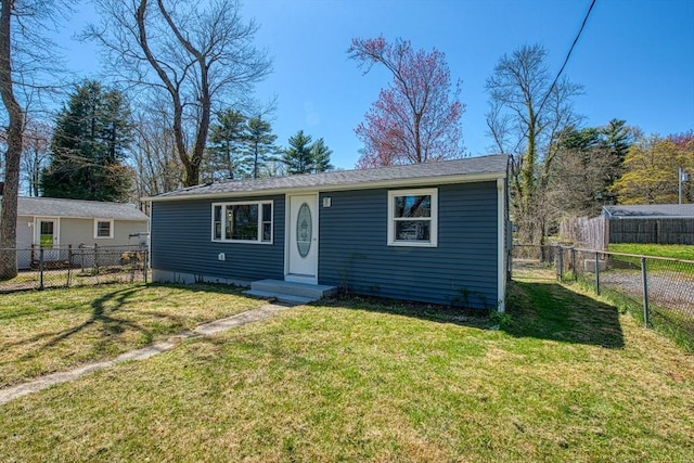 22 3rd, Lakeville, MA 02347 - view of front of property with a fenced backyard and a front lawn