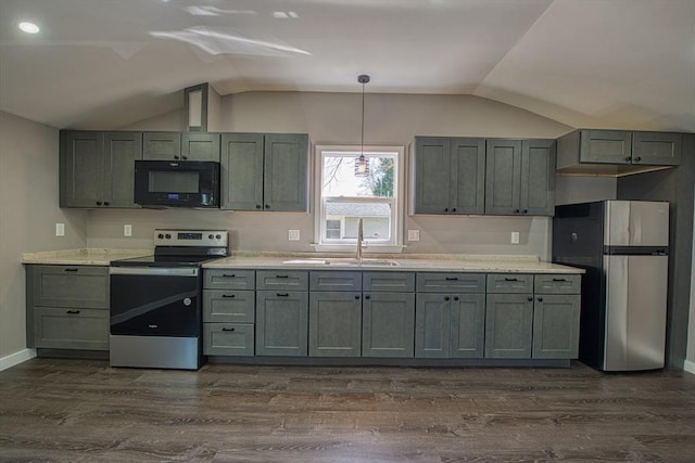 22 3rd, Lakeville, MA 02347 - kitchen featuring stainless steel appliances, vaulted ceiling, a sink, and dark wood-type flooring