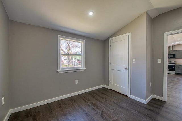 22 3rd, Lakeville, MA 02347 - unfurnished bedroom featuring baseboards, dark wood finished floors, and lofted ceiling
