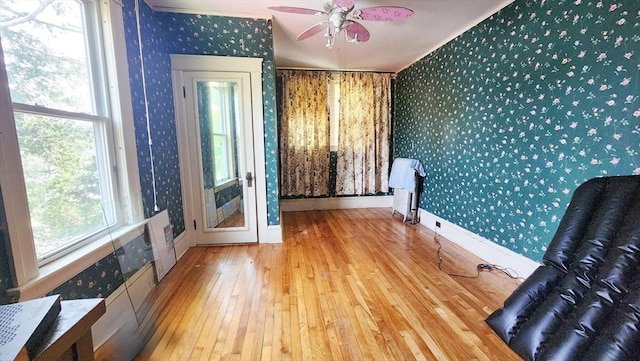 132 Institute Rd, Worcester, MA 01602 - unfurnished room with wallpapered walls, ornamental molding, hardwood / wood-style floors, and a ceiling fan