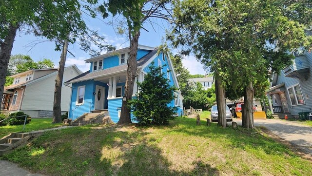 132 Institute Rd, Worcester, MA 01602 - view of front of home with a porch and a front lawn