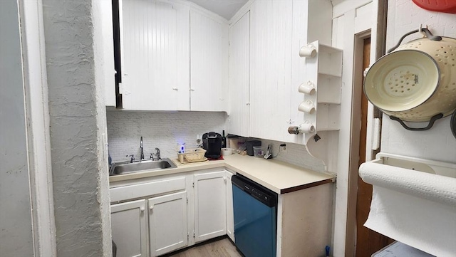 132 Institute Rd, Worcester, MA 01602 - kitchen with dishwasher, white cabinetry, light countertops, and decorative backsplash
