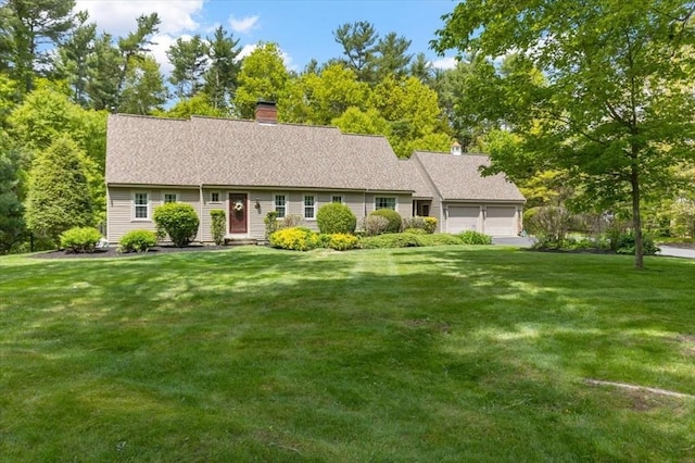 single story home with a garage, a front lawn, and a chimney