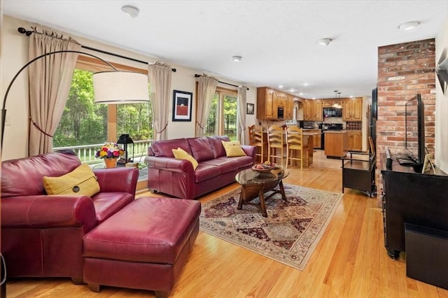 living room featuring light wood-style flooring