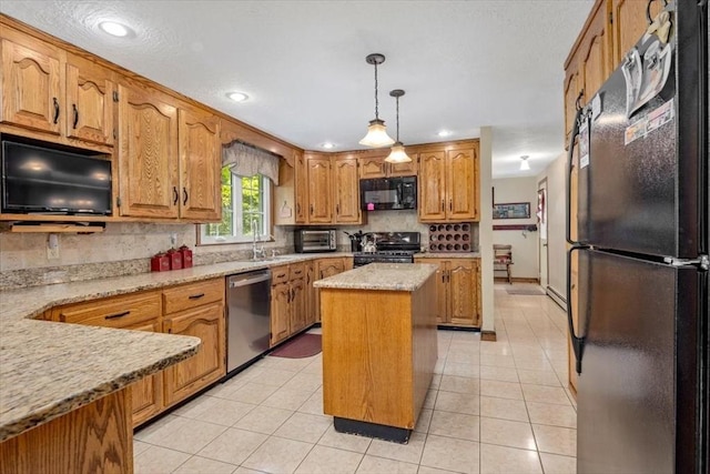 kitchen with black appliances, tasteful backsplash, decorative light fixtures, light tile patterned floors, and recessed lighting