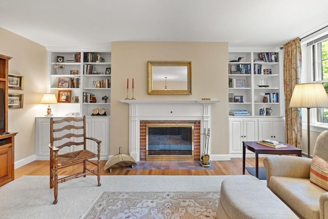5 Myrtle St Unit 3, Boston, MA 02114 - living area with wood finished floors, a fireplace, and built in features