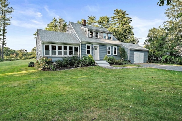 view of front facade featuring a shingled roof, an outdoor structure, a chimney, and a front lawn