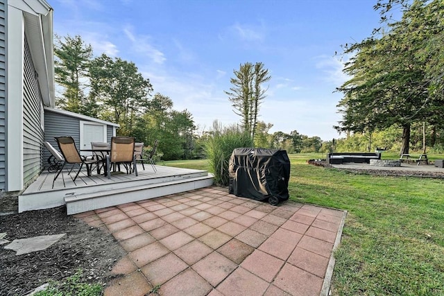 view of patio featuring a deck and outdoor dining area