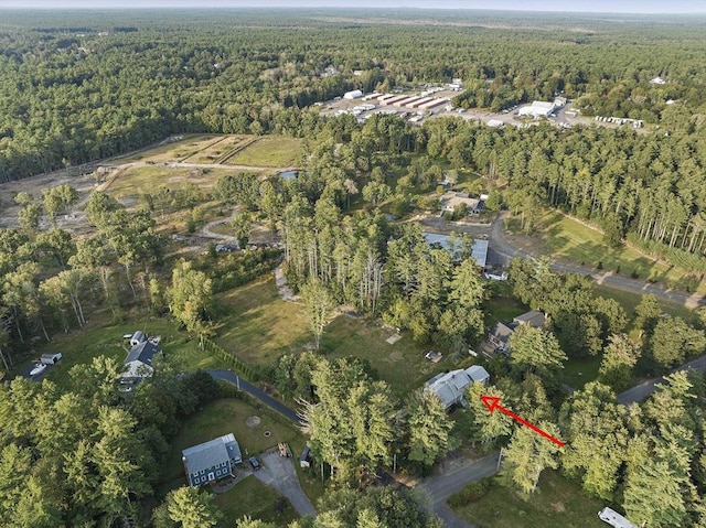 aerial view with a wooded view