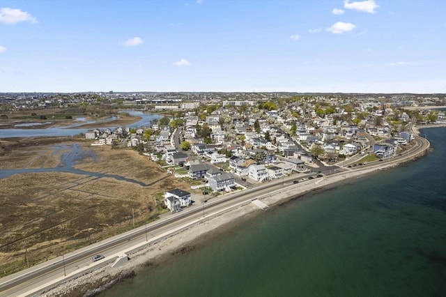 view of property location with nearby suburban area and a nearby body of water