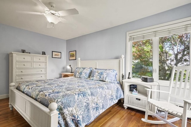bedroom featuring wood finished floors and ceiling fan