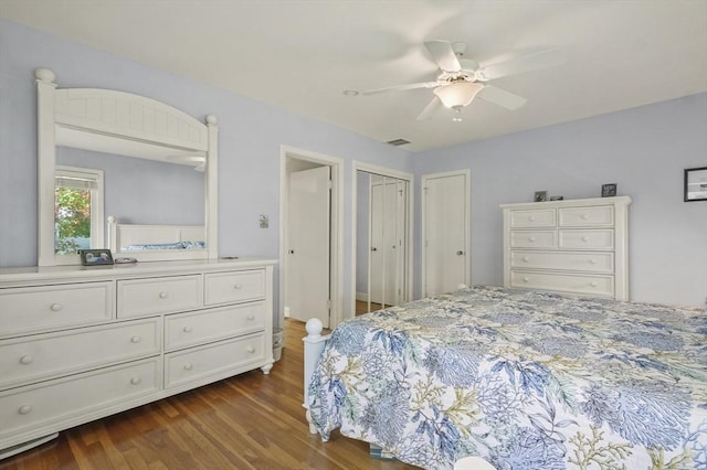 bedroom featuring dark wood finished floors and a ceiling fan