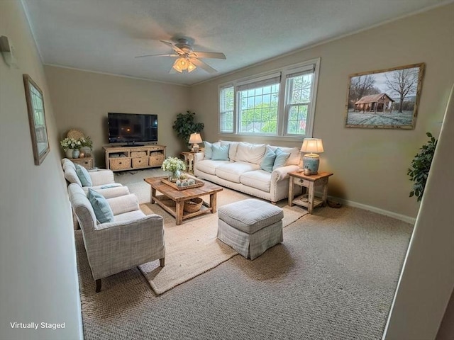 174 Upper County Unit 2-15, Dennis, MA 02639 - carpeted living room featuring a ceiling fan, ornamental molding, and baseboards