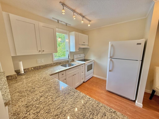 174 Upper County Unit 2-15, Dennis, MA 02639 - kitchen with white appliances, a sink, white cabinets, light wood-style floors, and a textured ceiling