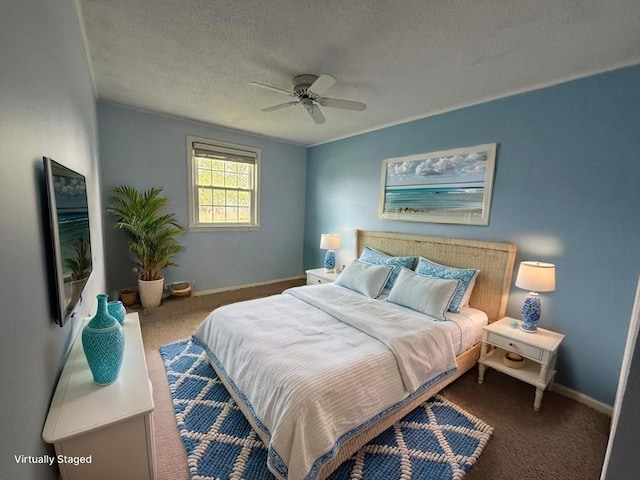 174 Upper County Unit 2-15, Dennis, MA 02639 - carpeted bedroom with baseboards, a textured ceiling, and ceiling fan
