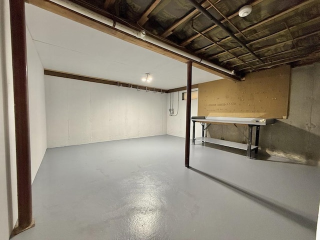 174 Upper County Unit 2-15, Dennis, MA 02639 - basement with a workshop area