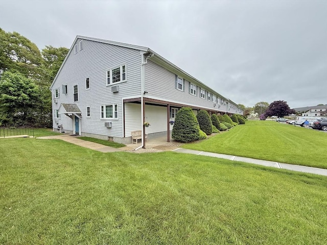 174 Upper County Unit 2-15, Dennis, MA 02639 - view of property exterior with a lawn