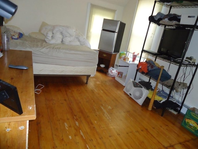 6-8 Imrie Rd, Boston, MA 02134 - bedroom featuring freestanding refrigerator and wood finished floors